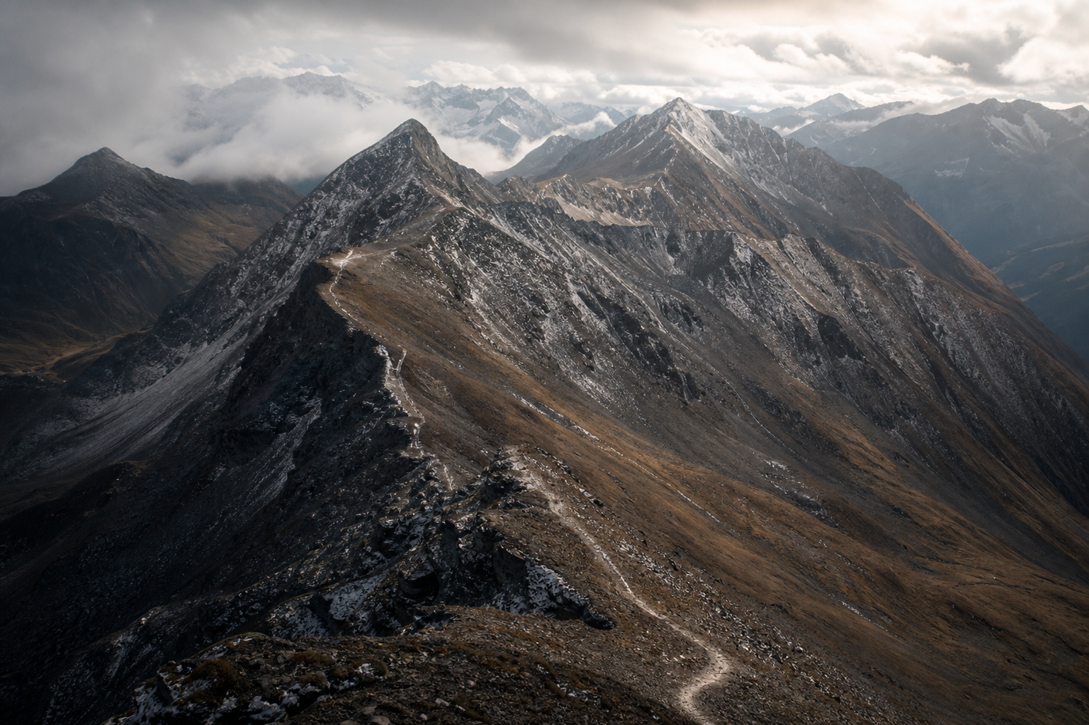 A mountain pass and ridgeline landscape suggesting disciplined movement through difficult terrain